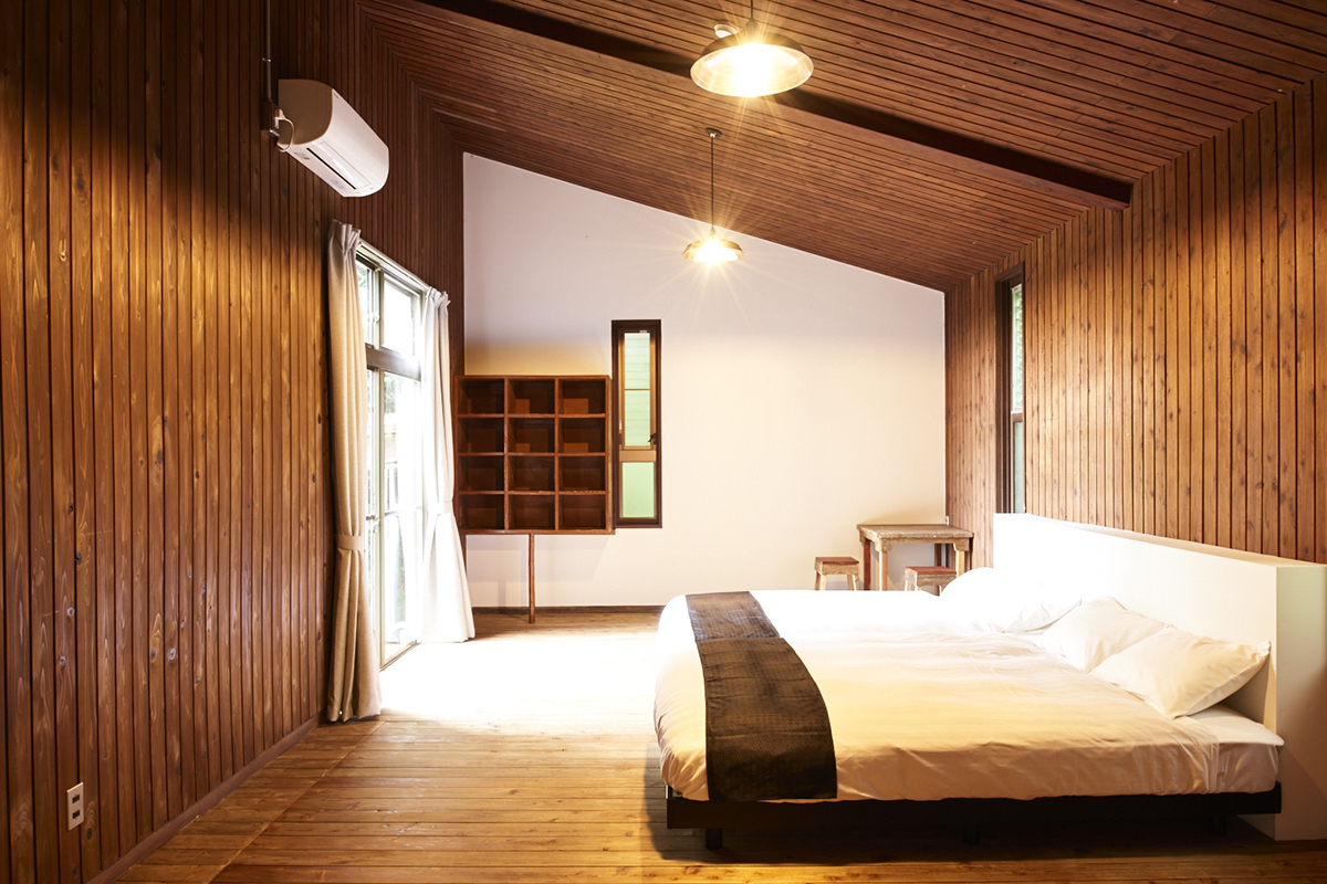One of the four bedrooms — a double bed.