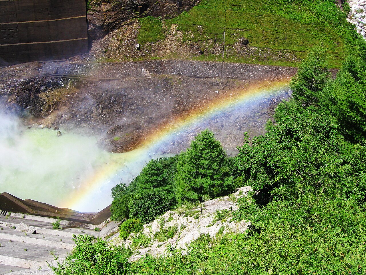 A rainbow in the spray of Kurobe Dam's summer water discharge