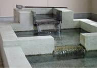 A communal spring-water washing spot in Ikuji
