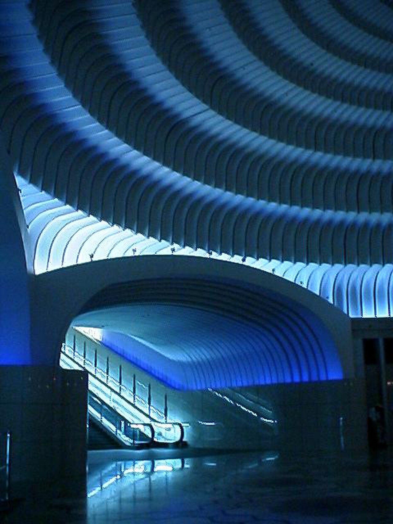 The blue escalator hall at the MOA Museum