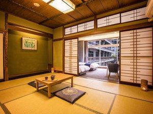 A tatami room with a bed alcove
