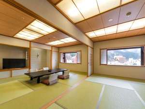 A Japanese tatami family room at Yamanoha