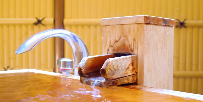 The room's own open-air onsen bath.